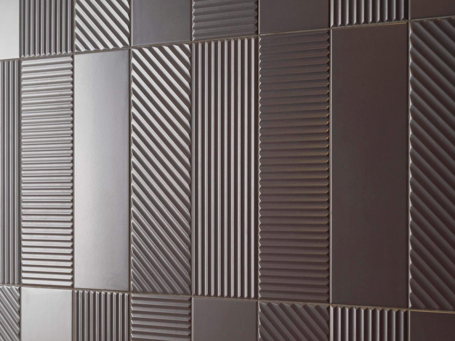 Porcelanosa Trend Dark 12.35x44.3x0.85 35x44.3cm shown in a styled room setting