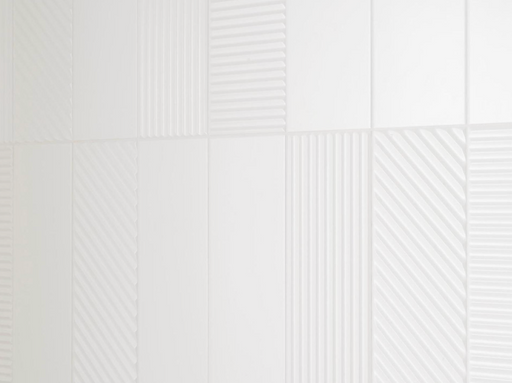 Porcelanosa Trend Snow 12.35x44.3x0.85 10x44.3cm shown in a styled room setting